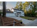 Two story home with white siding and two car garage at 4619 Spring St, Acworth, GA 30101