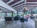 Covered patio with seating area, bar, and grill at 263 Mountainview Cir, Canton, GA 30115