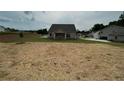 Spacious, grassy backyard of new construction house at 3940 Foxdale Ln, Cumming, GA 30028