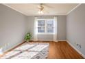 Bright bedroom with hardwood floors and large window at 578 Goldsboro Rd # B, Atlanta, GA 30307