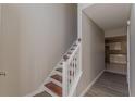 Entryway with stairs leading to the second floor at 1983 Smithfield Ave, Ellenwood, GA 30294