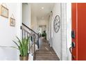 Bright entryway with hardwood floors, staircase, and decorative accents at 3010 Cambridge Mill St, Acworth, GA 30102