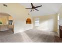 Living room with vaulted ceiling, fireplace and view to kitchen at 3869 Merryweather Trl, Austell, GA 30106