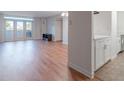 Open concept living and kitchen area with hardwood floors at 375 Ralph Mcgill Ne Blvd # 406, Atlanta, GA 30312