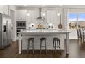Modern kitchen with large island and stainless steel appliances at 3836 Kastler Dr, South Fulton, GA 30349