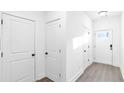 Clean and spacious hallway with storage at 1958 Dillon Dr, Lithonia, GA 30058