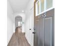 Bright and airy entryway with hardwood floors at 1958 Dillon Dr, Lithonia, GA 30058