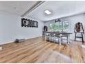 Farmhouse-style dining room with wooden table, hardwood floors, and western decor at 198 Oak Hill Cir, Canton, GA 30114