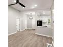 Bright living room featuring hardwood floors and an open floorplan at 2396 Abner Nw Pl, Atlanta, GA 30318