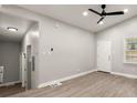 Spacious living area with hardwood floors and neutral walls at 2396 Abner Nw Pl, Atlanta, GA 30318