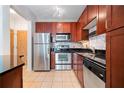 Modern kitchen with stainless steel appliances and hardwood floors at 400 17Th Nw St # 2120, Atlanta, GA 30363
