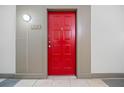 Inviting red front door entrance to condo at 400 17Th Nw St # 2120, Atlanta, GA 30363