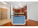 Modern kitchen with stainless steel appliances and hardwood floors at 400 17Th Nw St # 2120, Atlanta, GA 30363