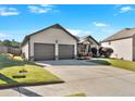 Two-story house with two-car garage and landscaped yard at 911 Mcduffie Cir, Douglasville, GA 30134