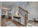 Bright entryway with hardwood floors and staircase at 4627 Molder Dr, Buford, GA 30518