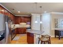 Modern kitchen with granite countertops and stainless steel appliances at 2300 Peachford Rd # 1205, Dunwoody, GA 30338