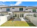 Covered patio, fenced backyard, and grassy area at 118 Briargate Dr, Johns Creek, GA 30097