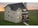 Two-story house with beige siding and dark roof at 2816 Monica Sw Ct, Atlanta, GA 30311