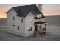 Two-story house with beige siding and dark roof at 2816 Monica Sw Ct, Atlanta, GA 30311
