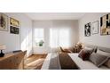 Bright bedroom with large window and dresser at 1121 Allene Sw Ave # 301, Atlanta, GA 30310