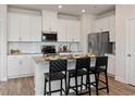 Modern kitchen with stainless steel appliances and granite countertops at 2761 Hawthorne Way, College Park, GA 30337