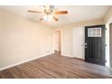 Living room featuring hardwood floors and ceiling fan at 2112 Royal Fox Way, Decatur, GA 30032