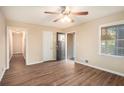 Bright living room featuring hardwood floors and neutral wall colors at 2112 Royal Fox Way, Decatur, GA 30032
