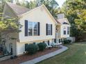 One-story house with a walkway and landscaping at 304 Ridge Hill Cir, Canton, GA 30115
