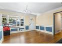 Spacious living room with hardwood floors and a large window at 422 White Oak Nw Dr, Lilburn, GA 30047
