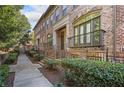 Brick townhouse with walkway, landscaping, and inviting entryway at 2380 Crescent Park Ct # 4, Atlanta, GA 30339