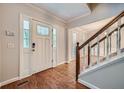 Bright entryway with hardwood floors and staircase at 2459 Jacks View Ct, Snellville, GA 30078