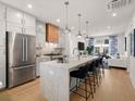 Modern kitchen with stainless steel appliances and an island at 201 New St # 2201-9, Decatur, GA 30030