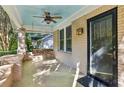 Charming front porch with a porch swing and light blue ceiling at 906 Courtenay Ne Dr, Atlanta, GA 30306