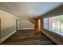 Bright living room with hardwood floors and stairs at 1904 Sandtown Sw Rd, Atlanta, GA 30311