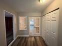 Home office with French doors and built-in shelving at 1904 Sandtown Sw Rd, Atlanta, GA 30311