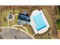 Community pool, clubhouse and playground viewed from above at 569 Whitman (Lot 159) Ln, Stockbridge, GA 30281