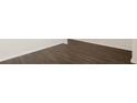 Dark hardwood floors in a bright room at 576 Whitman (2020) Ln, Stockbridge, GA 30281