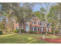 Two-story brick home with a large front yard at 2582 Fairview Ln, Jonesboro, GA 30236
