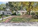 Light green house with a brick walkway and large yard at 1618 Belmont Sw Ave, Atlanta, GA 30310