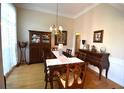 Formal dining room featuring a wood table and chairs at 1025 Copper Creek Dr, Canton, GA 30114
