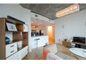 Open kitchen with granite countertops and stainless steel appliances at 400 W Peachtree Nw St # 1713, Atlanta, GA 30308