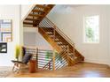 Modern staircase with wood and metal accents at 1281 Avalon Ne Pl, Atlanta, GA 30306