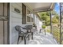 Front porch with black metal railing and seating at 2243 Tiger Flowers Nw Dr, Atlanta, GA 30314