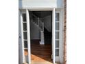 Open entryway with hardwood floors and staircase at 533 Riverbirch Trce, Stone Mountain, GA 30087