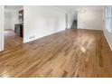 Hardwood floors in bright living room, open to kitchen at 2390 Sandgate Rd, Atlanta, GA 30349
