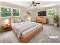 Large main bedroom with carpeted floor and ample natural light at 2390 Sandgate Rd, Atlanta, GA 30349