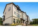 Townhome community with attractive exteriors and landscaping at 1086 Battery Park Rd, Decatur, GA 30033