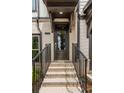 Inviting front entrance with brick steps and black metal railing at 1090 Battery Park Rd, Decatur, GA 30033