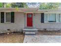 Newly painted red front door and steps leading to entryway at 1784 Danrich Dr, Decatur, GA 30032