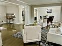 Open living space with comfortable seating, hardwood floors, and stylish decor at 2501 Henderson Mill Ne Rd, Atlanta, GA 30345